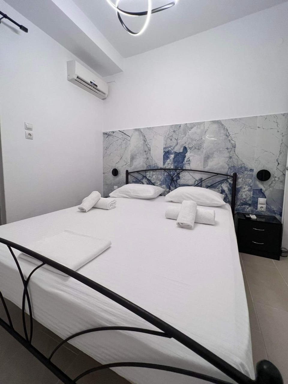 Bed, Photo of the whole room, Bedroom, towels, air conditioner