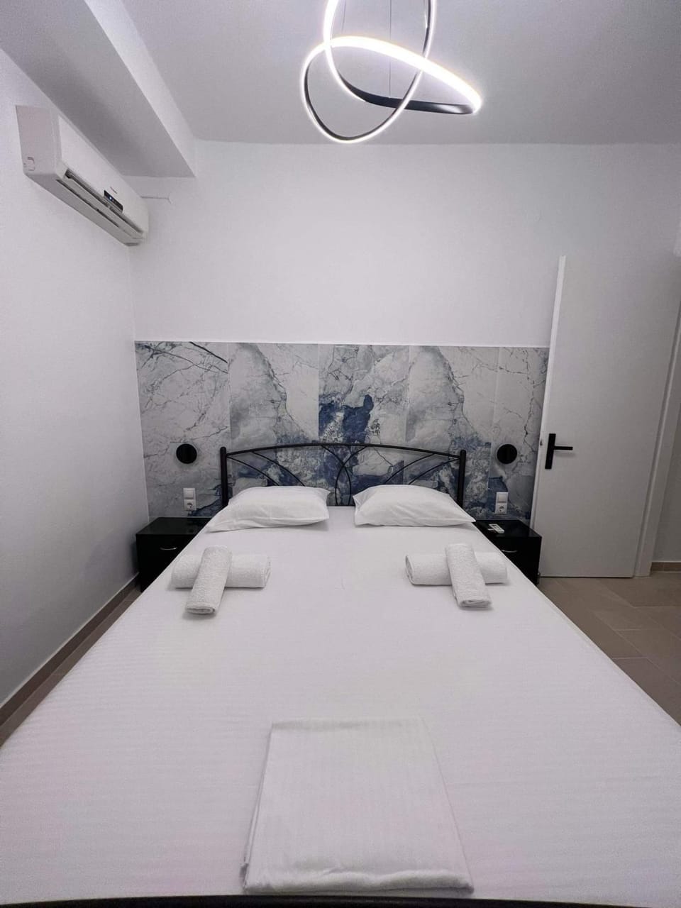 Bed, Photo of the whole room, Bedroom, towels, air conditioner