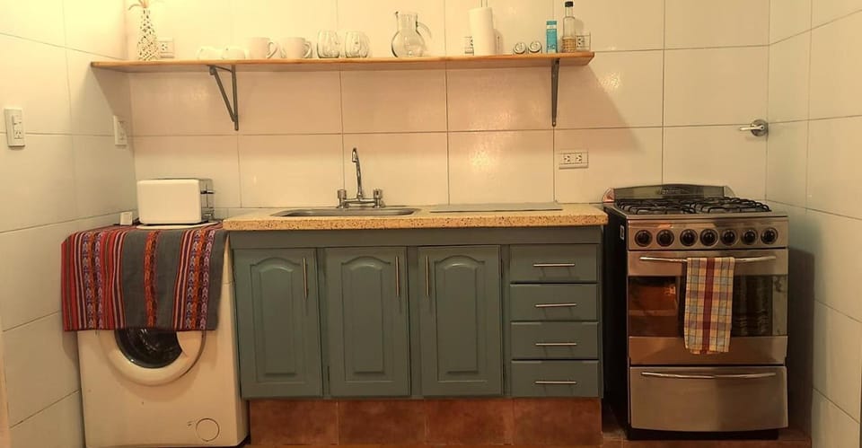 Kitchen or kitchenette, oven, stove
