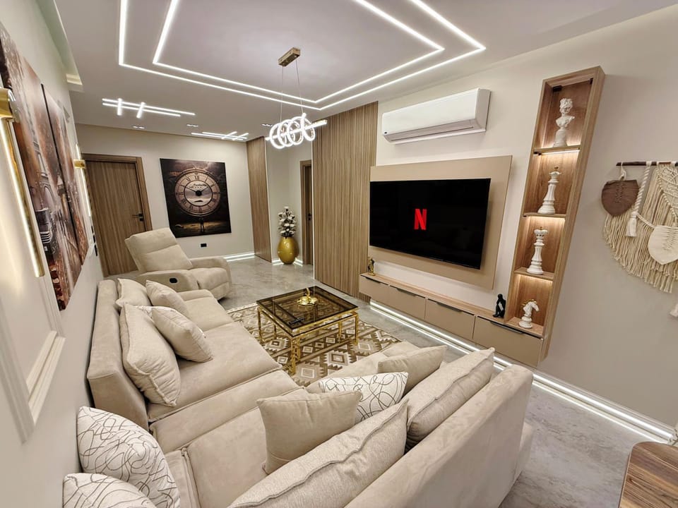 TV and multimedia, Living room, Seating area, fireplace, air conditioner