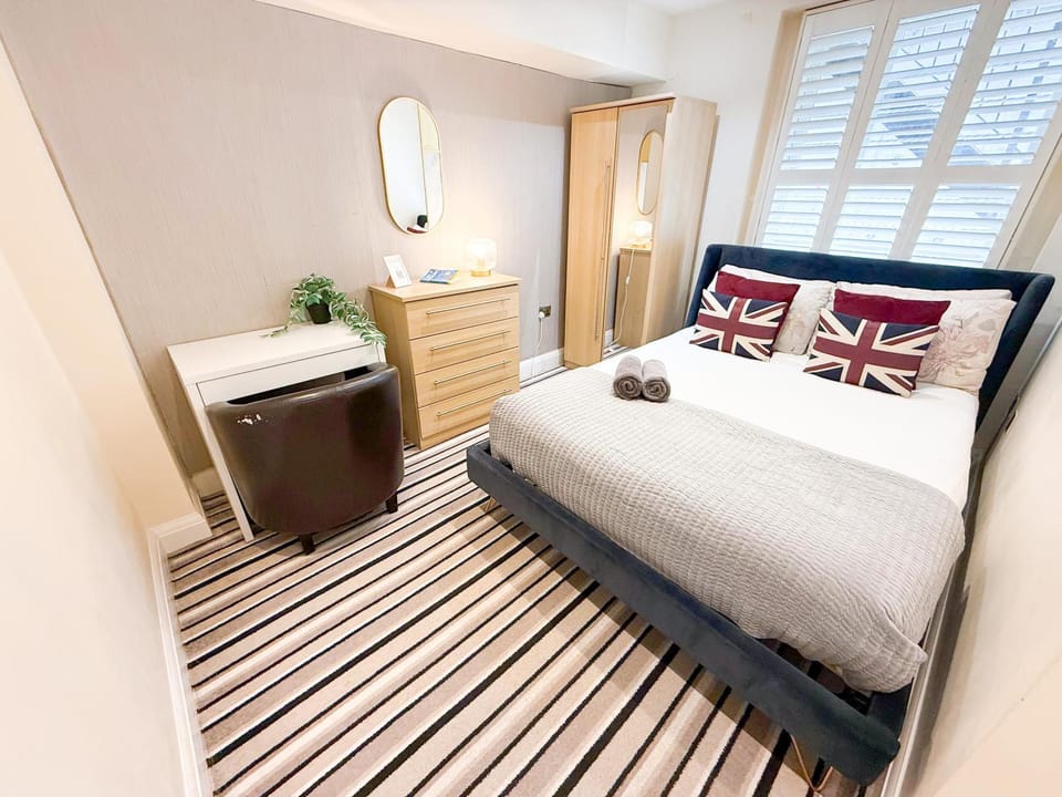 Bed, Seating area, Bedroom, towels, wardrobe