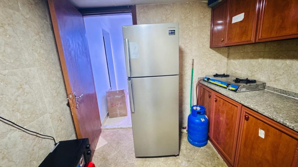 One Private Room Sharing Apartment Flat 31 Room 3 Apartment in Abu Dhabi