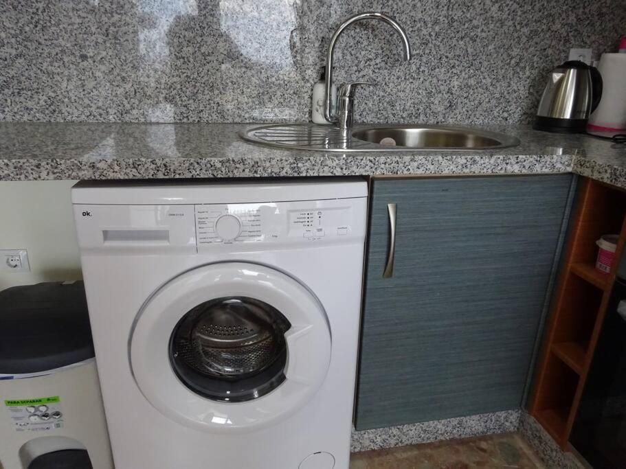 Kitchen or kitchenette, washing machine