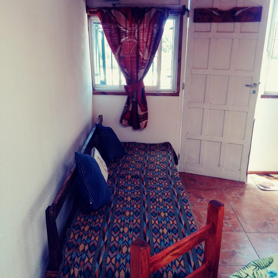 Bed, Living room, Seating area