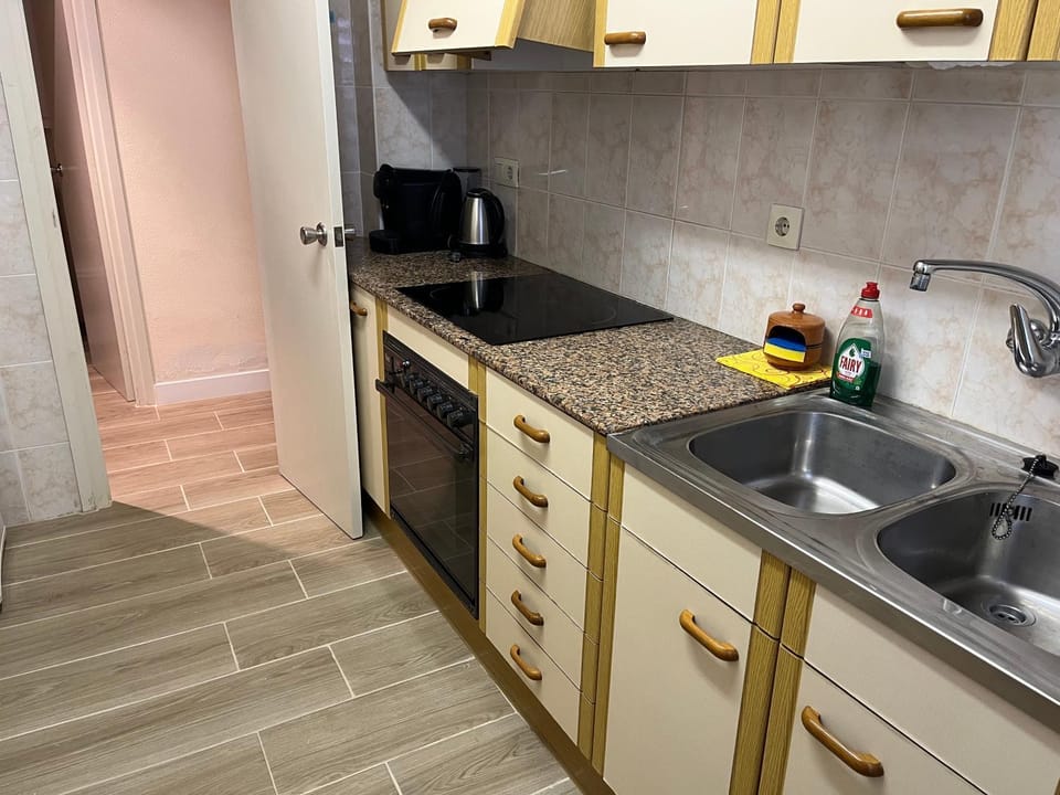 Kitchen or kitchenette, stove