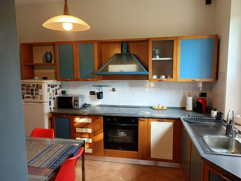 Kitchen or kitchenette, stove, toaster