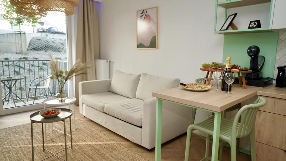 Kitchen or kitchenette, Living room, Seating area, Dining area