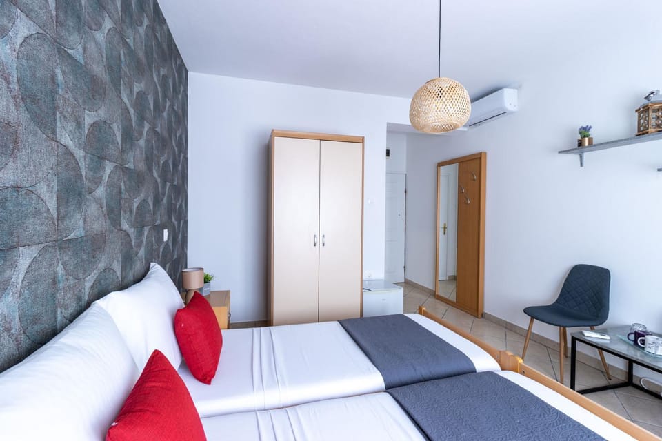 Bed, Seating area, Bedroom, wardrobe, air conditioner