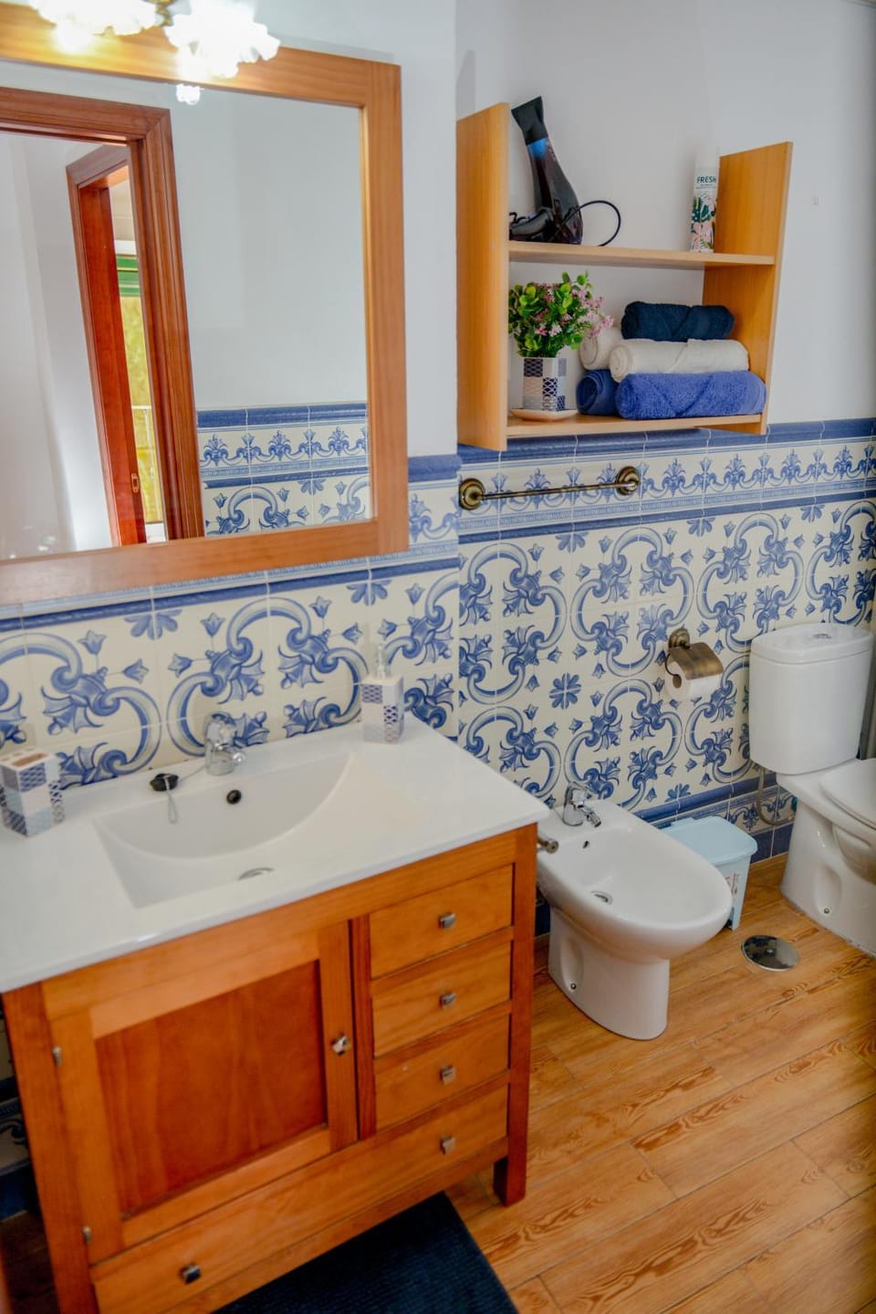 Toilet, Bathroom, hair dryier, towels