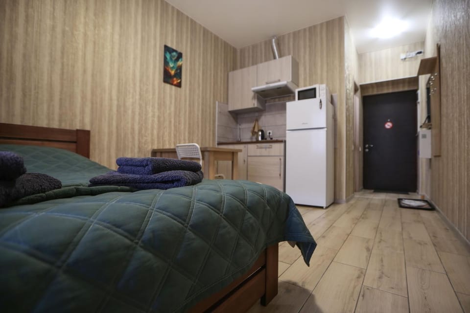 Kitchen or kitchenette, Living room, Seating area, stove