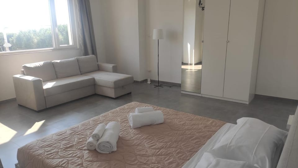 Bed, Living room, Photo of the whole room, Seating area, Bedroom, towels, wardrobe