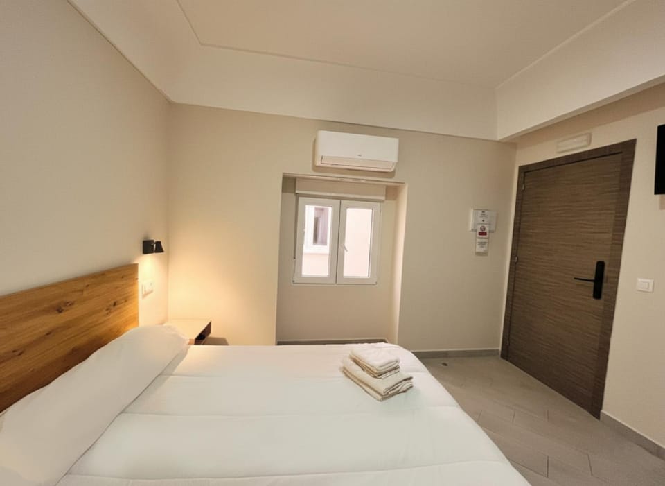 Bed, Bedroom, towels, wardrobe, air conditioner