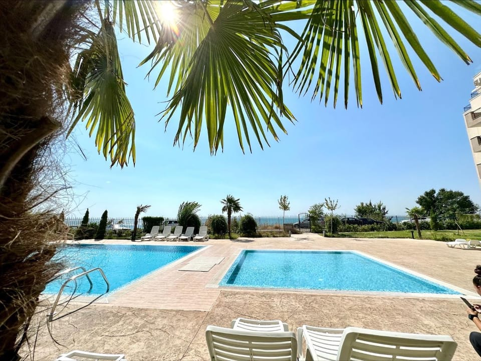 Swimming pool, sunbed