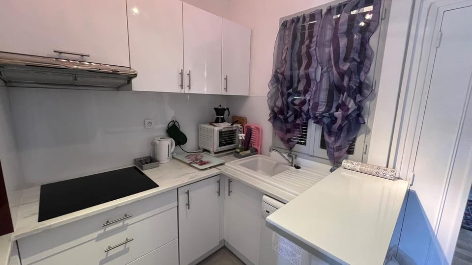 Kitchen or kitchenette, stove