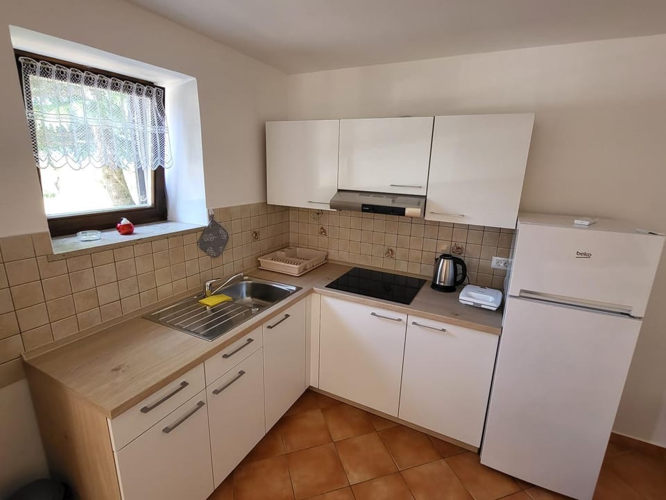 Kitchen or kitchenette, stove