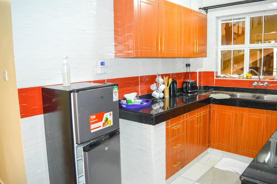 Kitchen or kitchenette, dishwasher, oven, stove, toaster