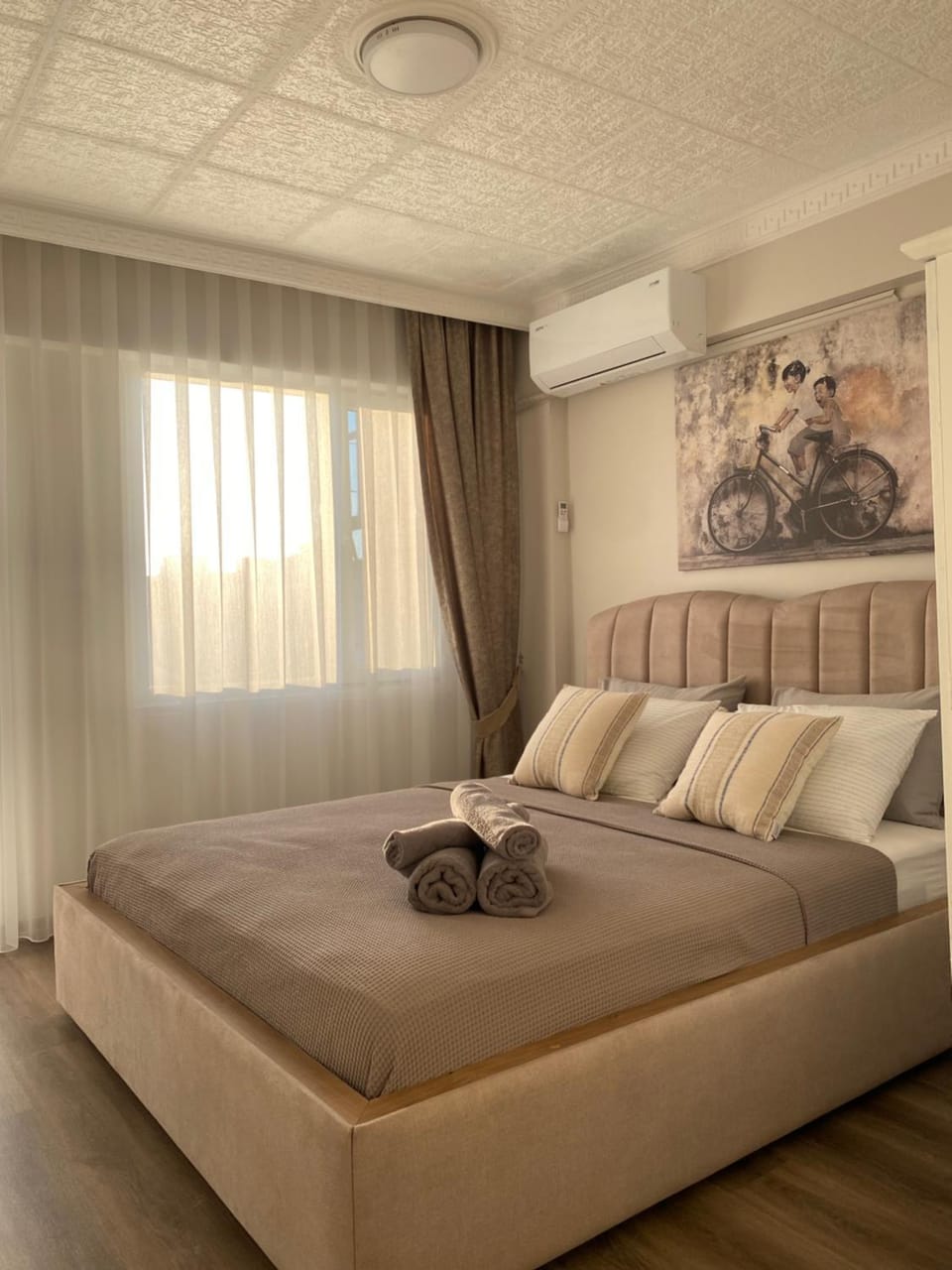 Bed, Photo of the whole room, Bedroom, towels, air conditioner