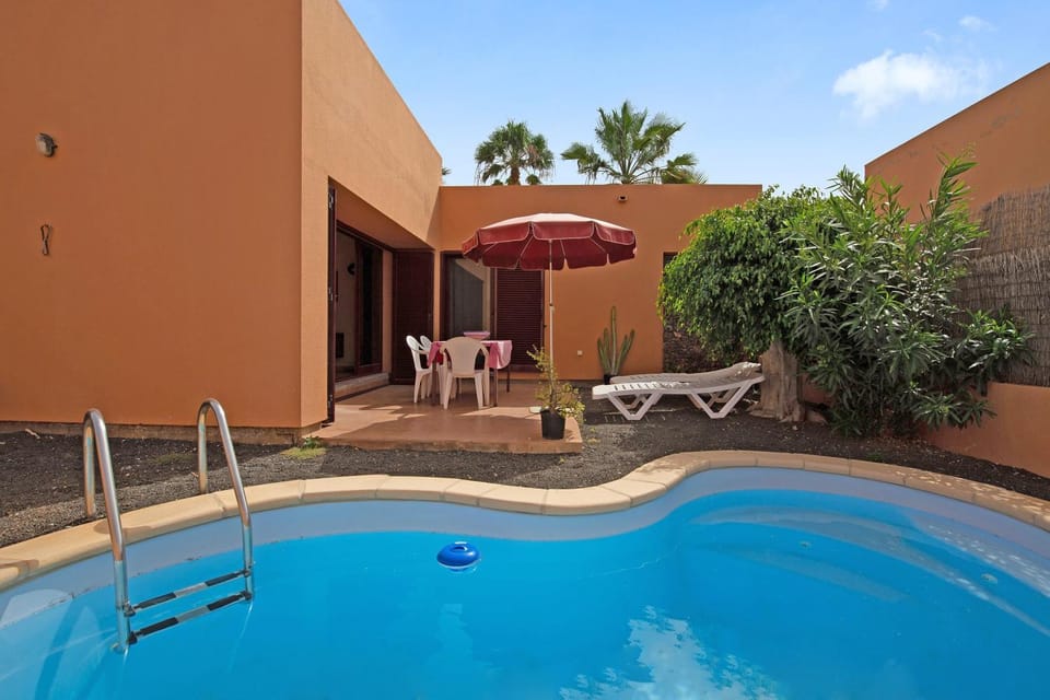 Property building, Living room, Swimming pool