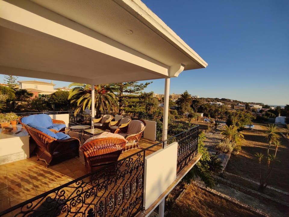 Property building, Natural landscape, Garden, View (from property/room), Balcony/Terrace, Seating area, Garden view