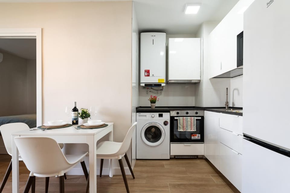 Kitchen or kitchenette, Living room, Dining area, oven, stove, toaster, washing machine