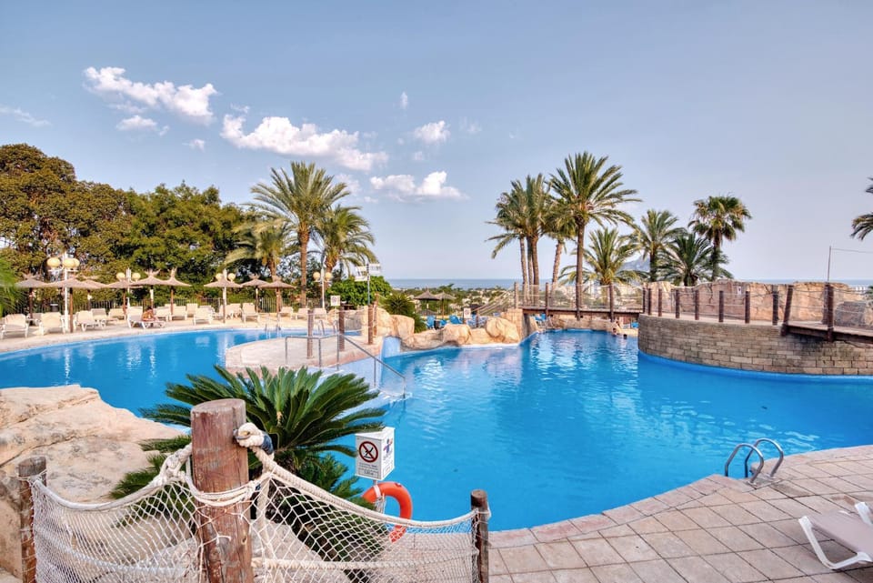 Property building, Living room, Swimming pool
