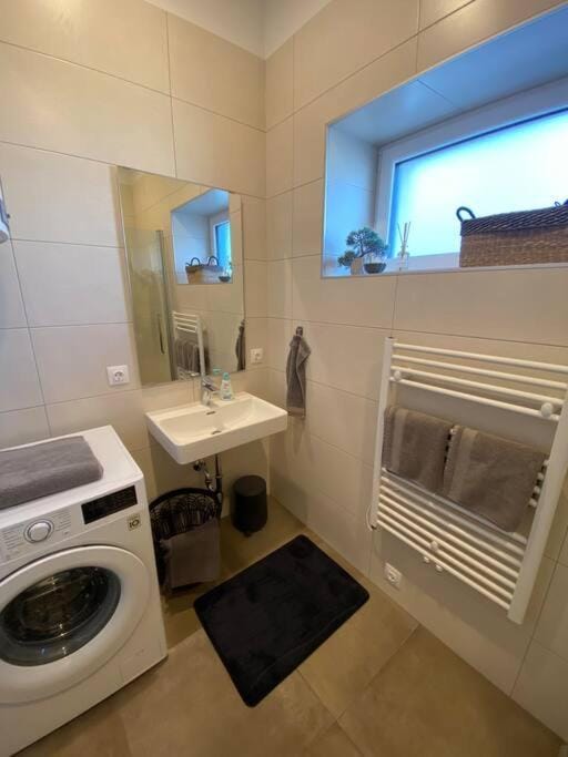 Toilet, Bathroom, towels, washing machine