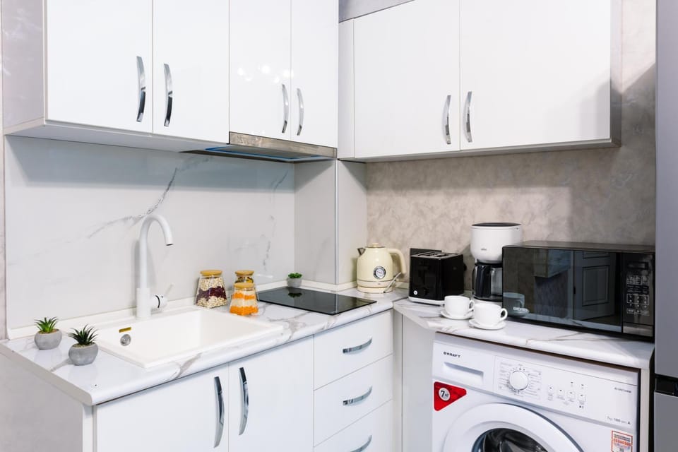 Coffee/tea facilities, Kitchen or kitchenette, minibar, toaster, washing machine