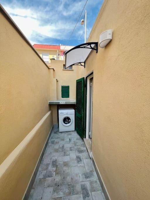 Inner courtyard view, laundry, washing machine