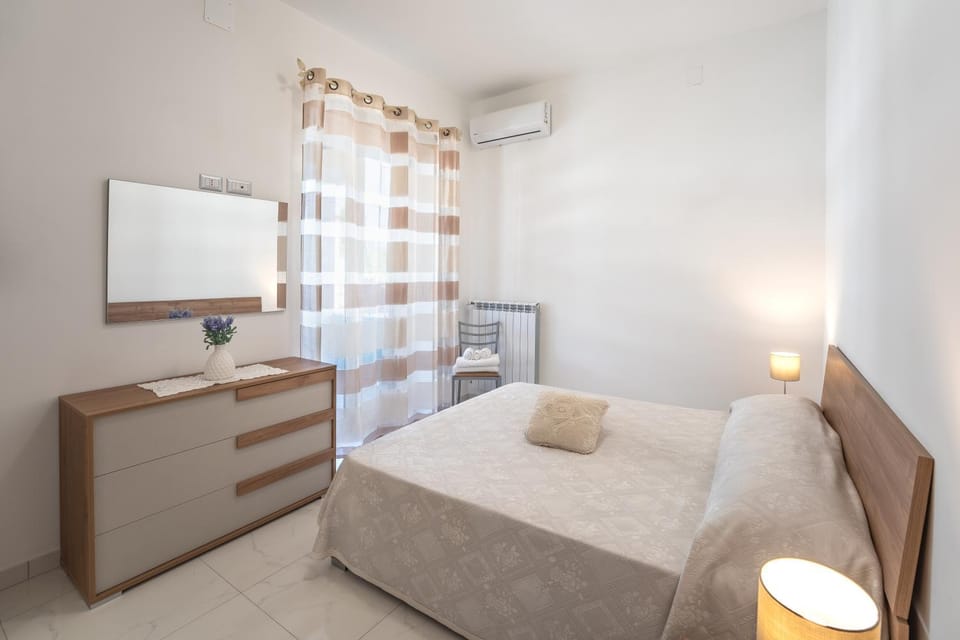 Bed, Balcony/Terrace, Photo of the whole room, Bedroom, hair dresser, wardrobe, air conditioner
