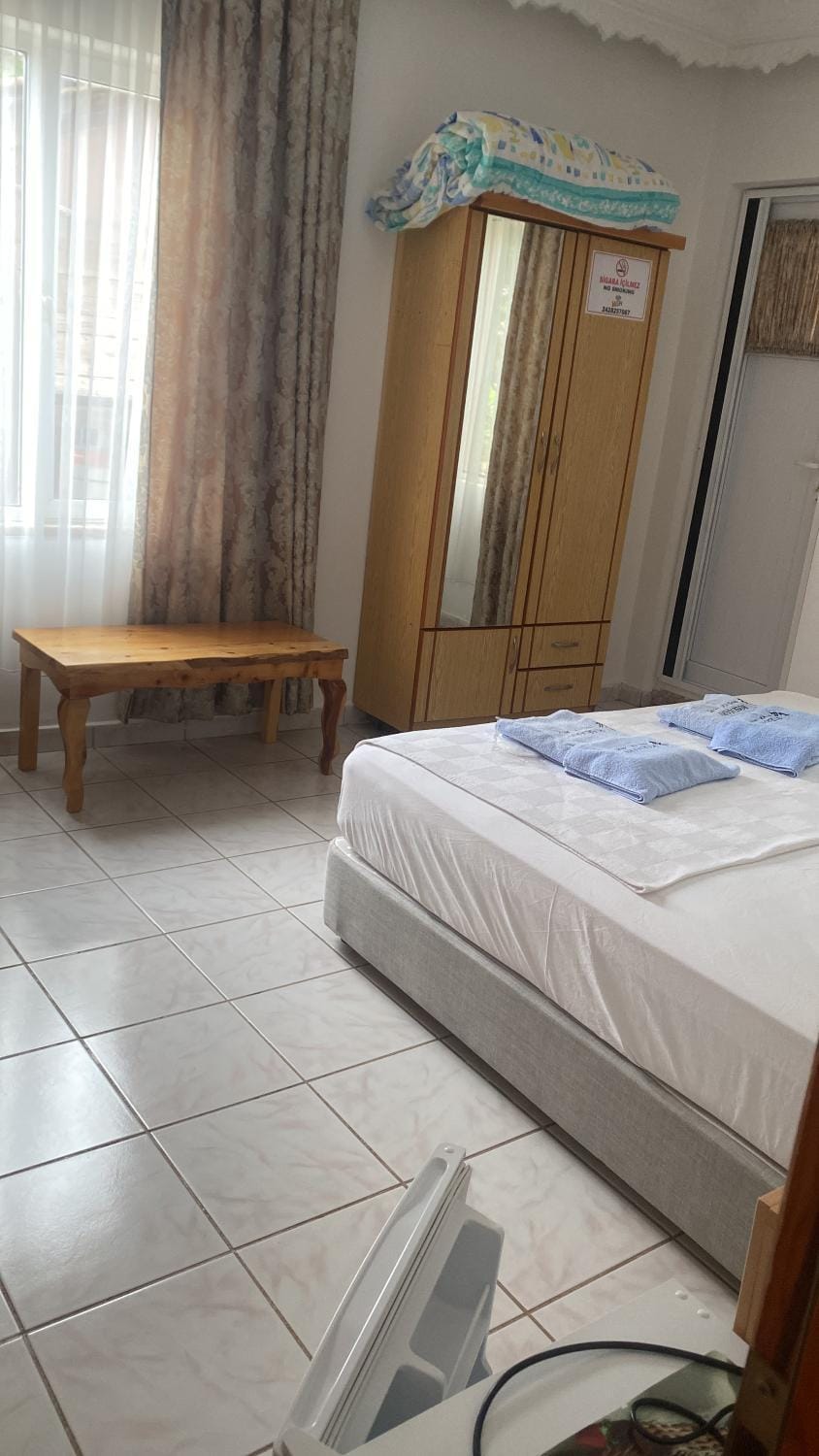 Bed, Photo of the whole room, towels, wardrobe