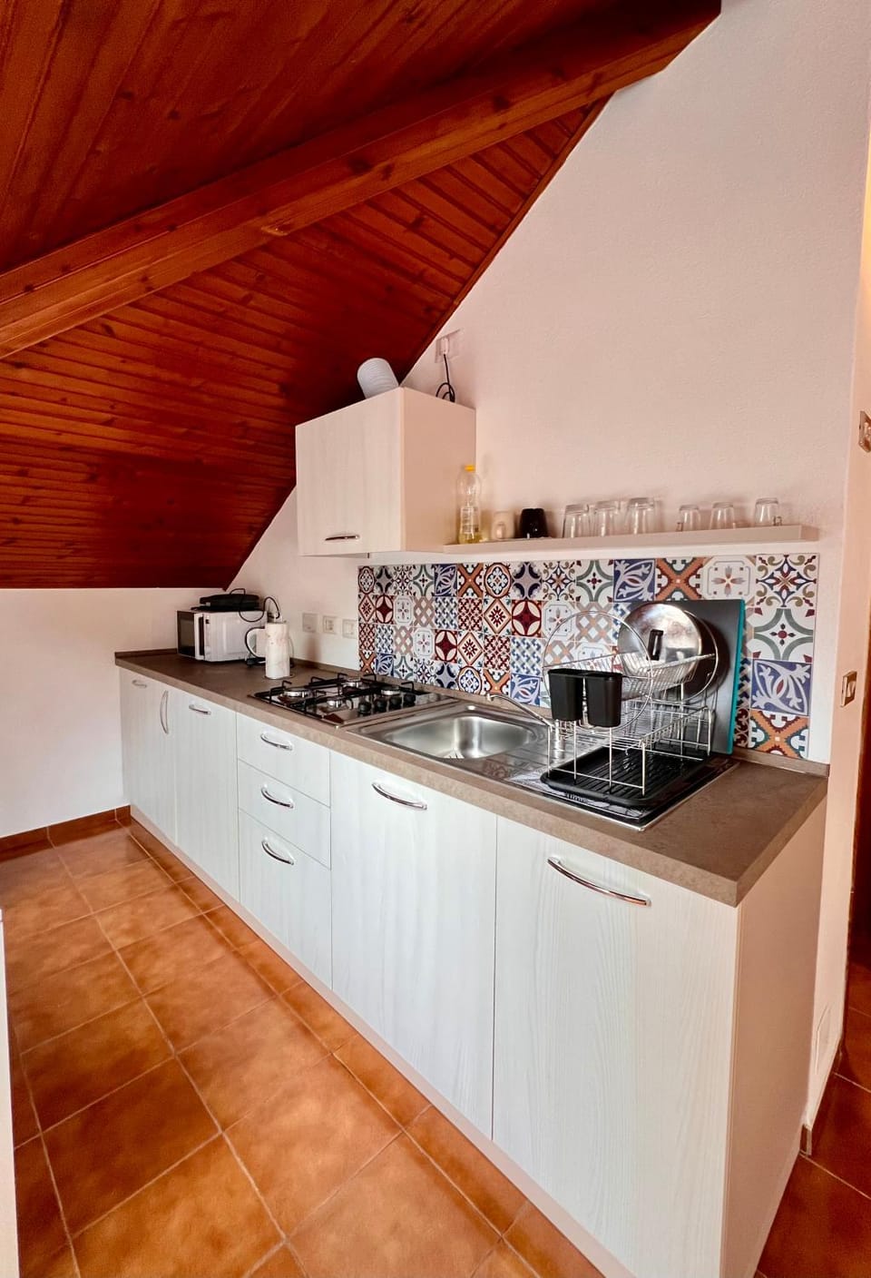 Kitchen or kitchenette, washing machine