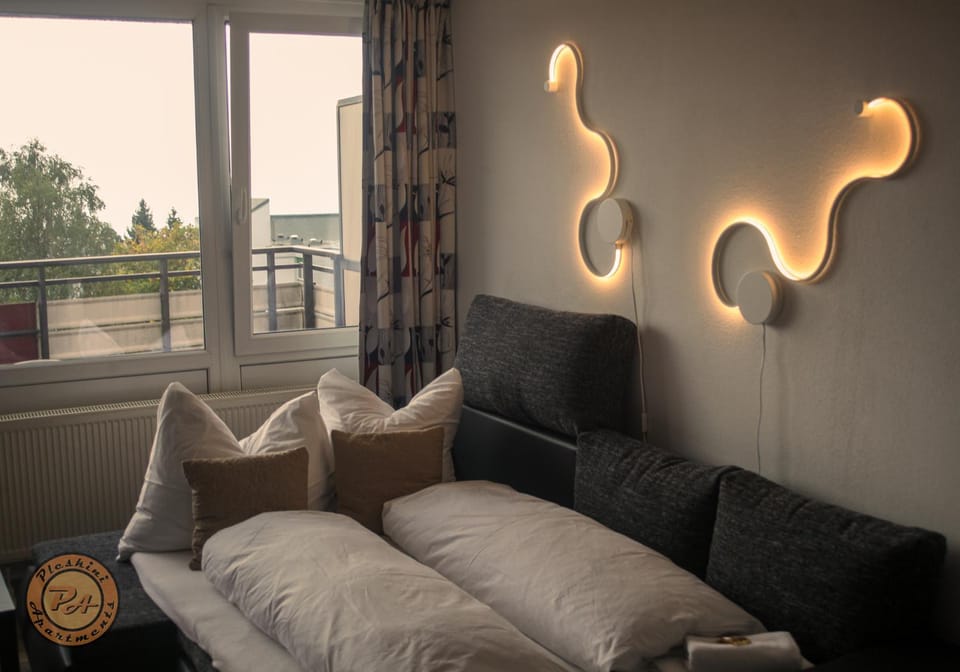 Bed, Living room, Seating area