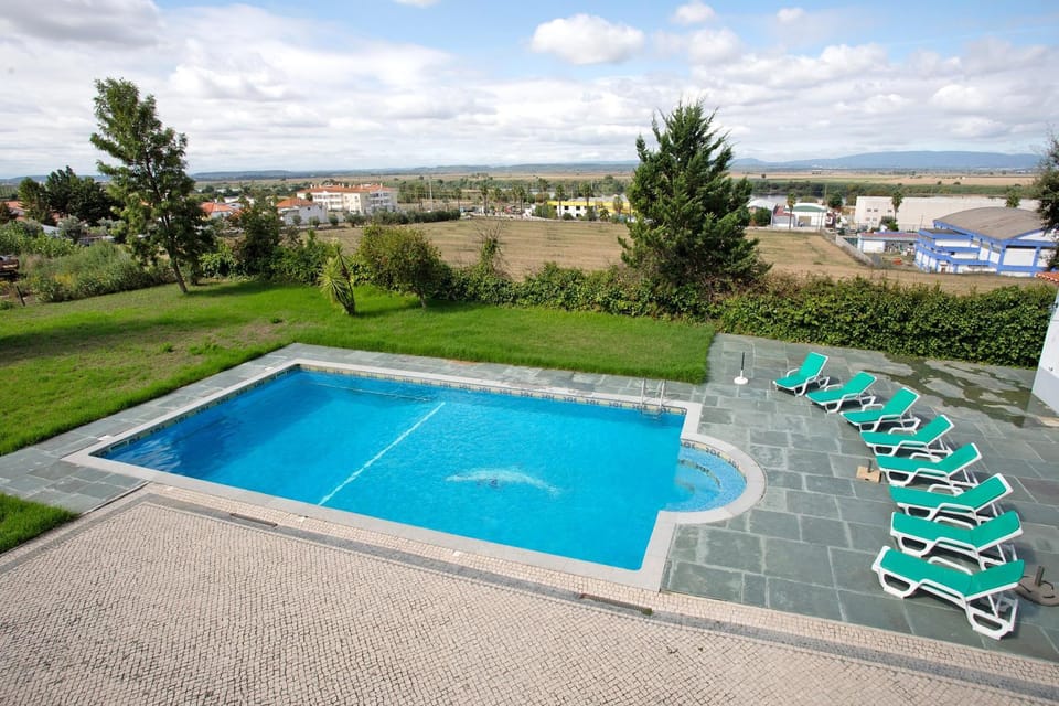Property building, Living room, Swimming pool