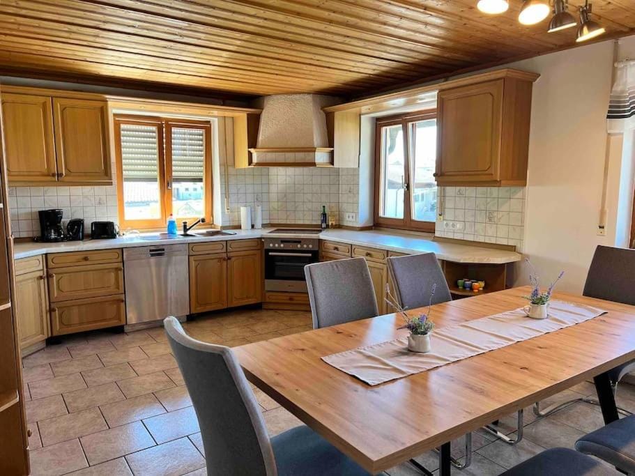 Kitchen or kitchenette, Dining area, dishwasher, stove, toaster