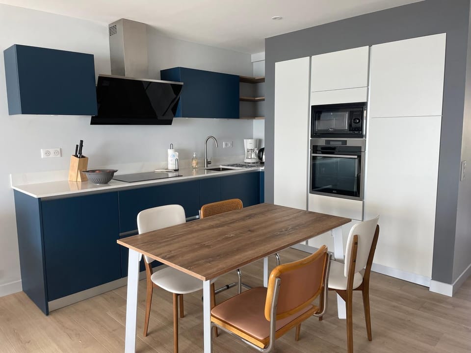 Dining area, dishwasher, oven, stove