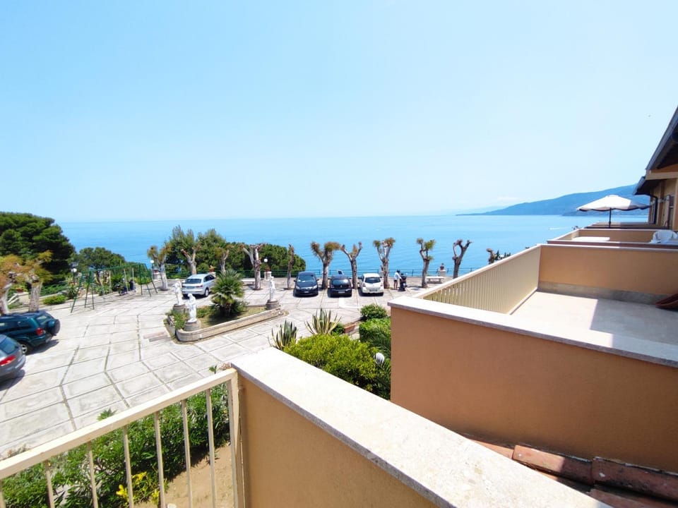 Property building, Day, Natural landscape, View (from property/room), Balcony/Terrace, Sea view, Parking