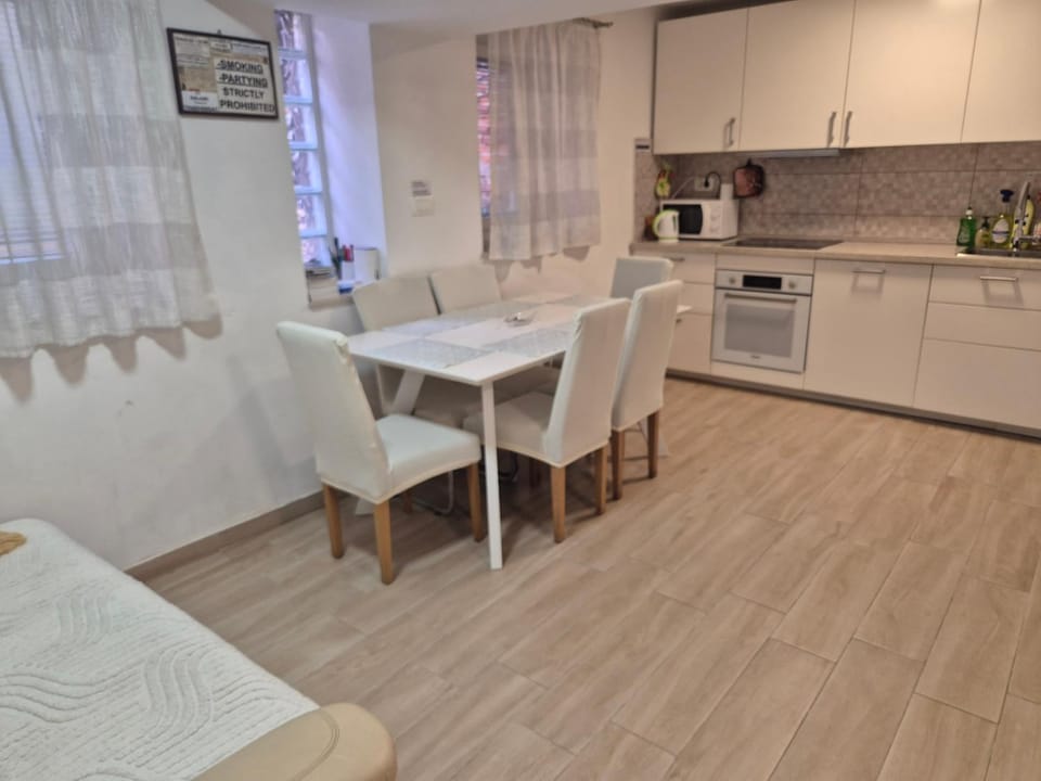 Kitchen or kitchenette, Dining area, dishwasher, oven, stove, toaster