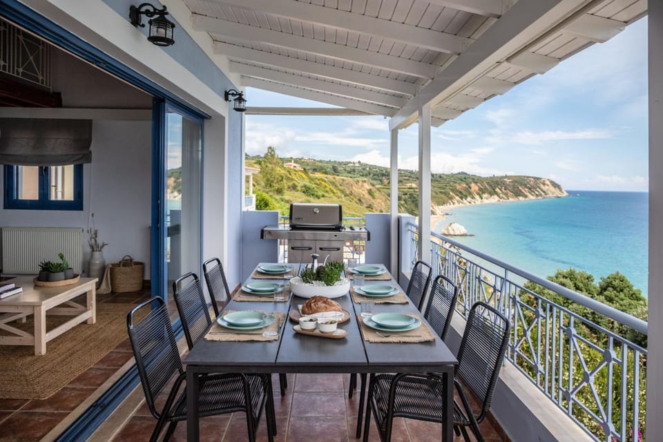View (from property/room), Balcony/Terrace, Seating area, Dining area, Beach, Sea view