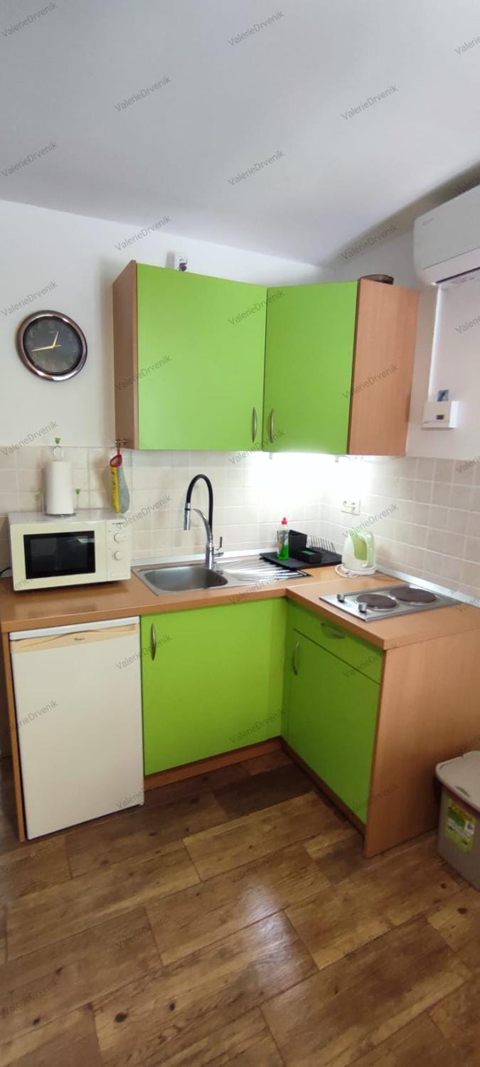 Kitchen or kitchenette, stove