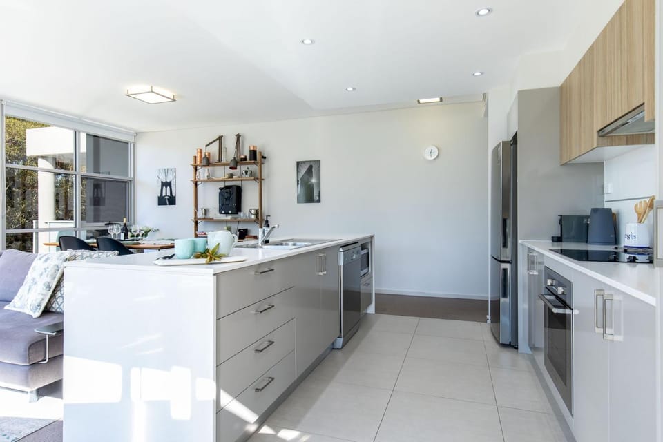Kitchen or kitchenette, dishwasher, oven, stove, toaster