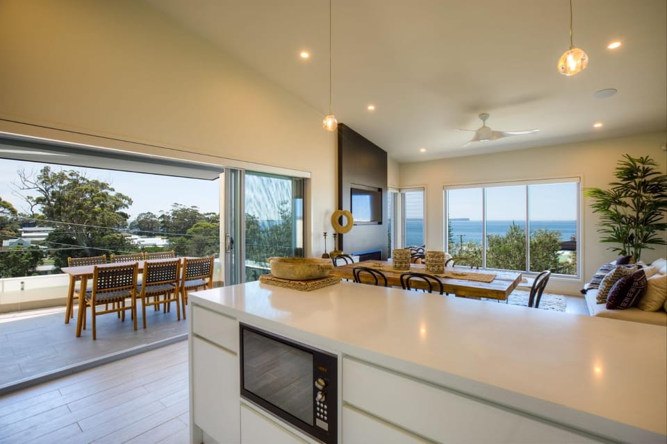 Kitchen or kitchenette, Living room, Seating area, Dining area, Sea view