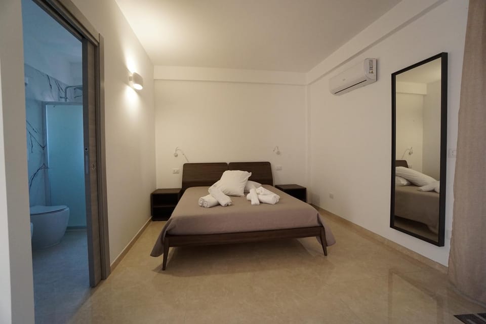 Bed, Photo of the whole room, Bedroom, towels, air conditioner