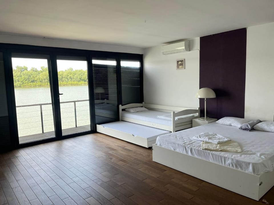 Bed, Photo of the whole room, Bedroom, towels, air conditioner