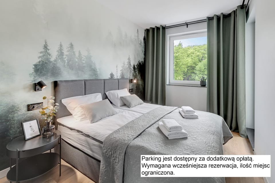 Bed, Photo of the whole room, Bedroom, Text overlay, towels
