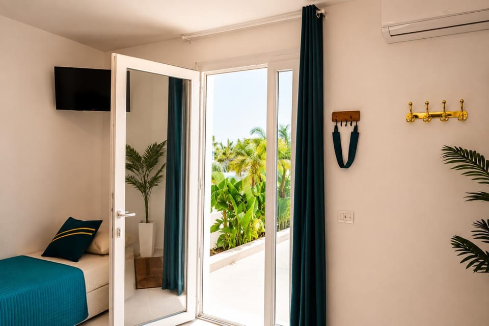 Monolocale elegante con design moderno e atmosfera tropical chic House in Nardò