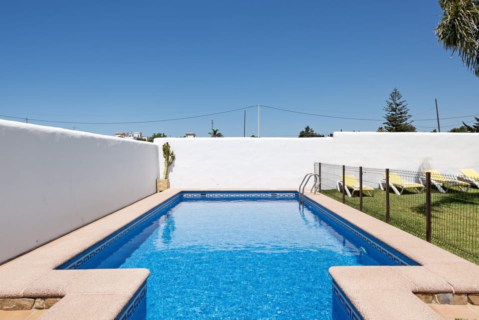 Property building, Living room, Swimming pool