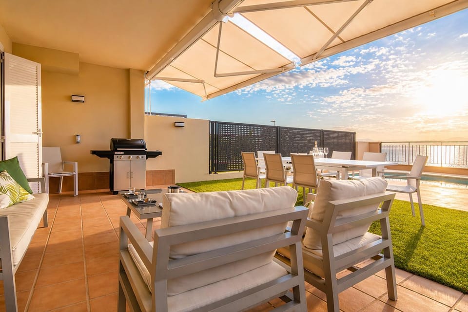 Patio, Day, BBQ facilities, View (from property/room), Balcony/Terrace, Seating area, Dining area, Pool view, Sea view, Swimming pool, Sunset, sunbed