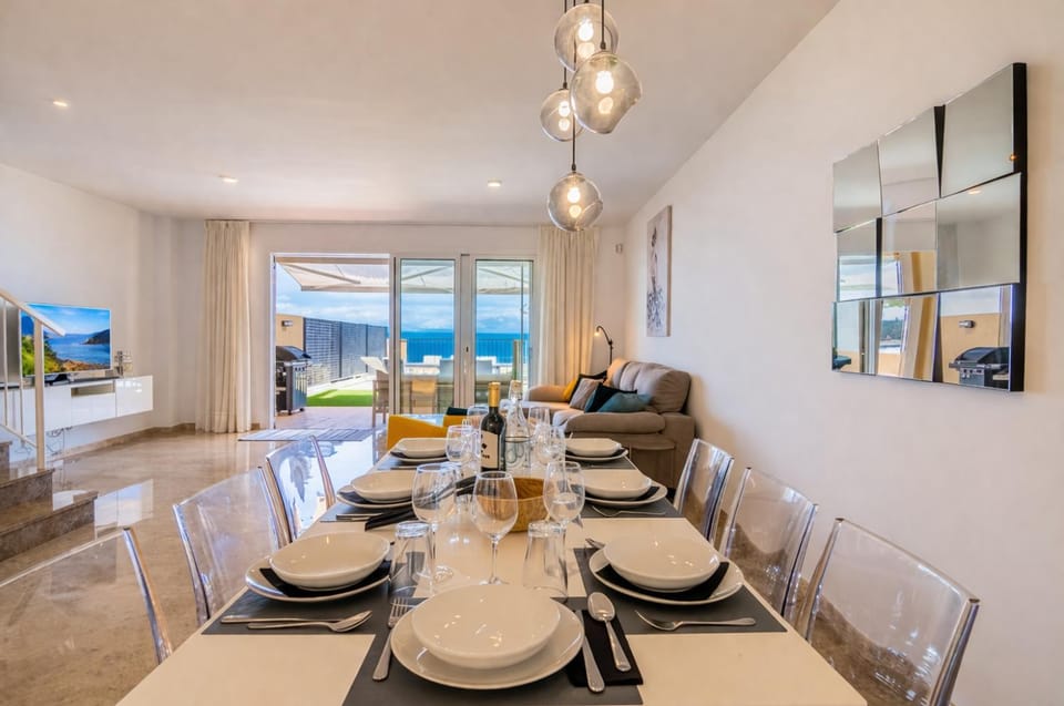 Living room, Seating area, Dining area, Pool view, Sea view
