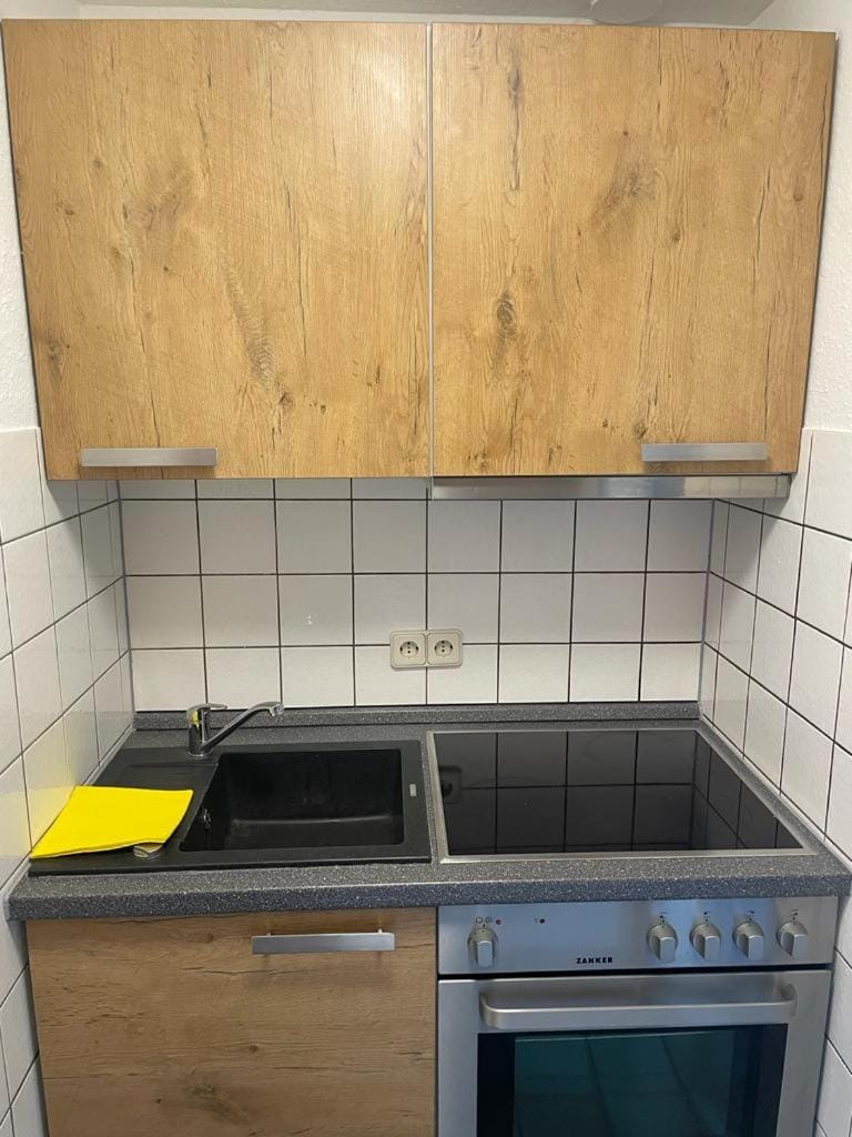 Kitchen or kitchenette, oven, stove