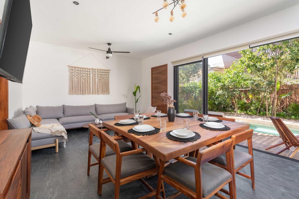 Living room, Seating area, Dining area, Garden view, Pool view, Swimming pool